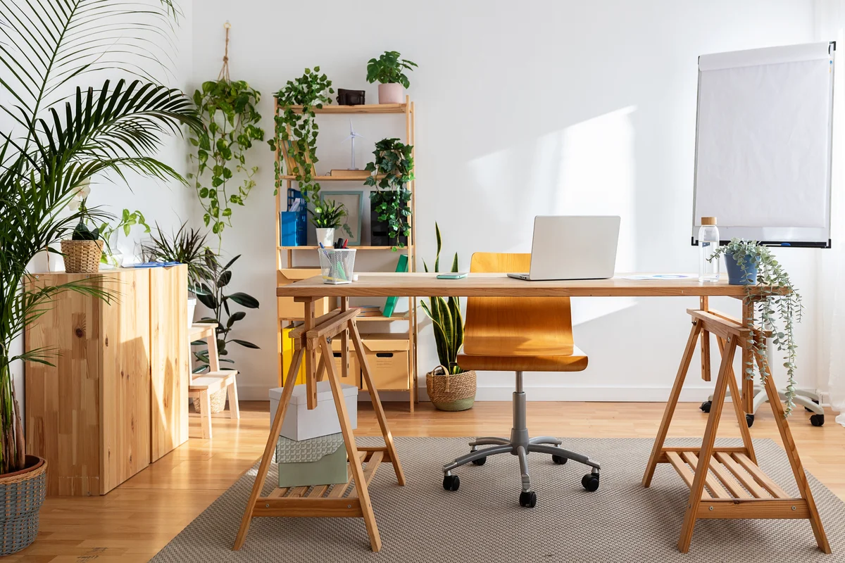 Small bright modern home office with large wood table