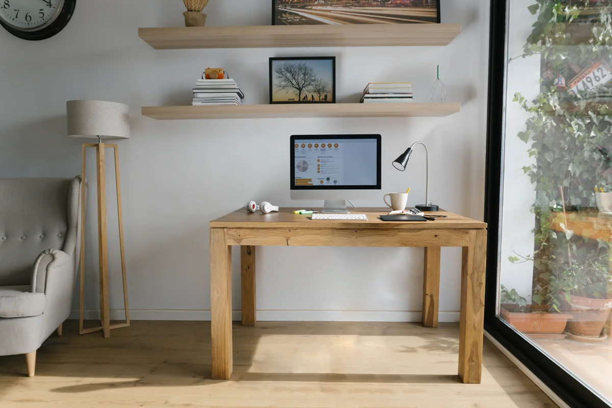 workspace with personal computer on wooden desk