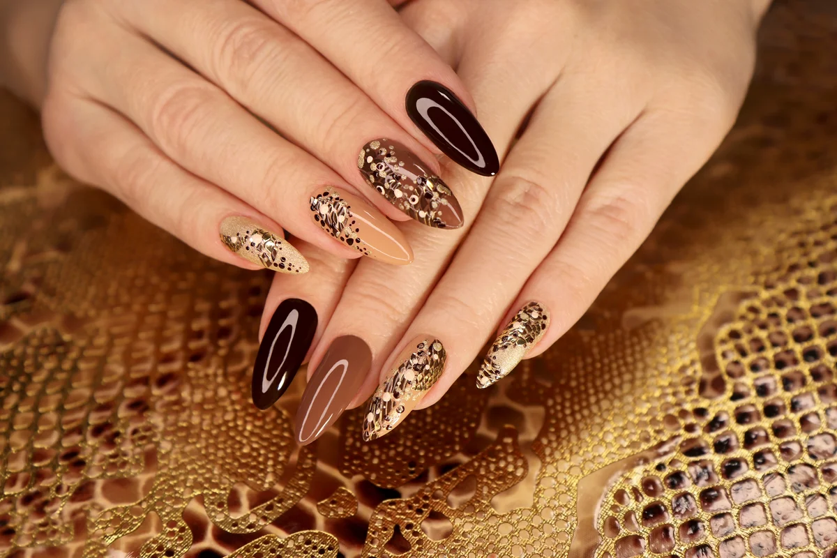 brown manicure with animal design