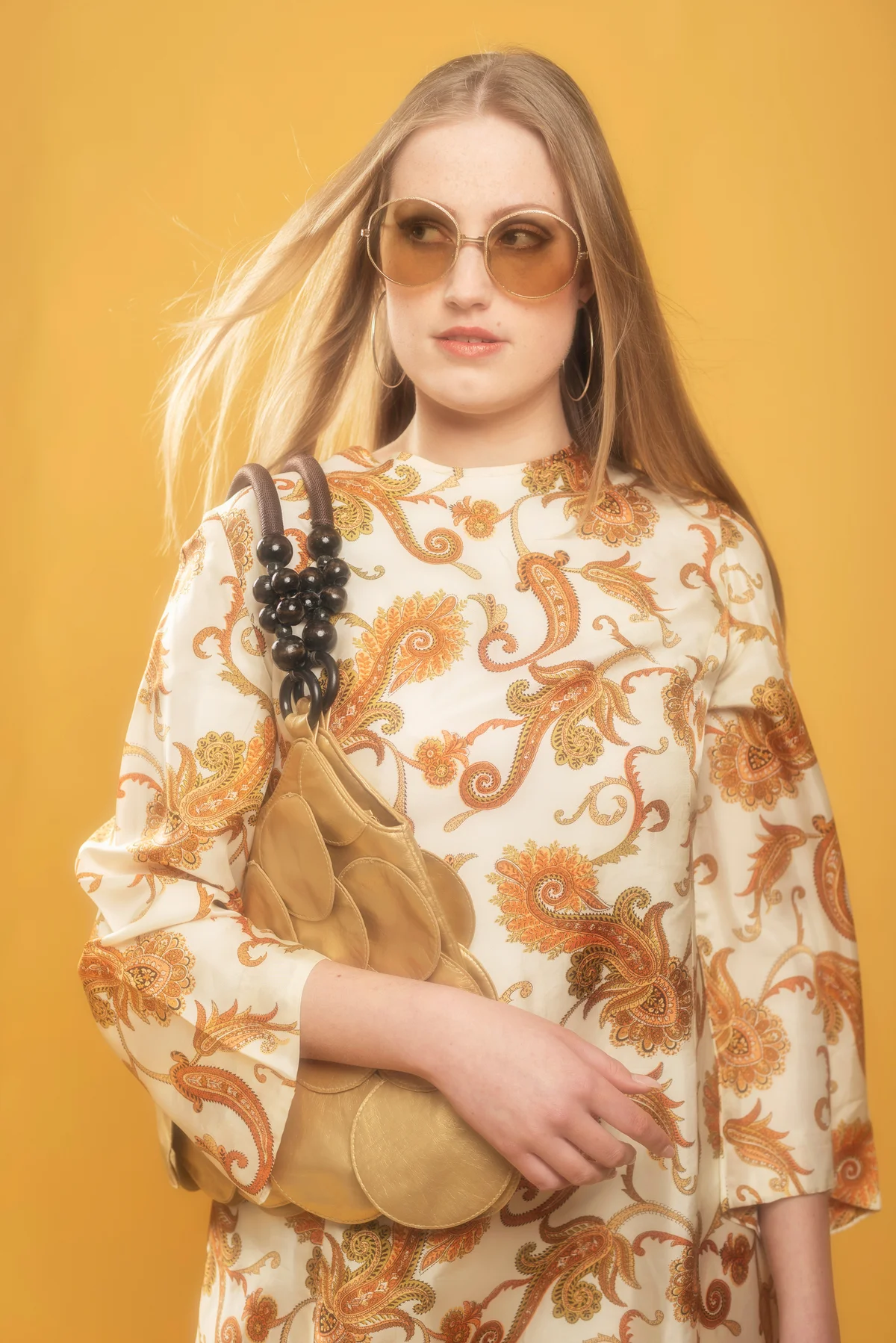 Fashionable blonde woman in retro dress