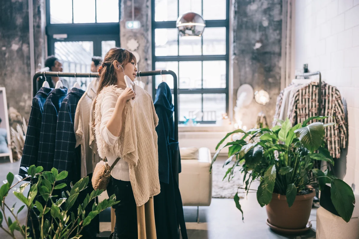 Asian woman shopping for clothes