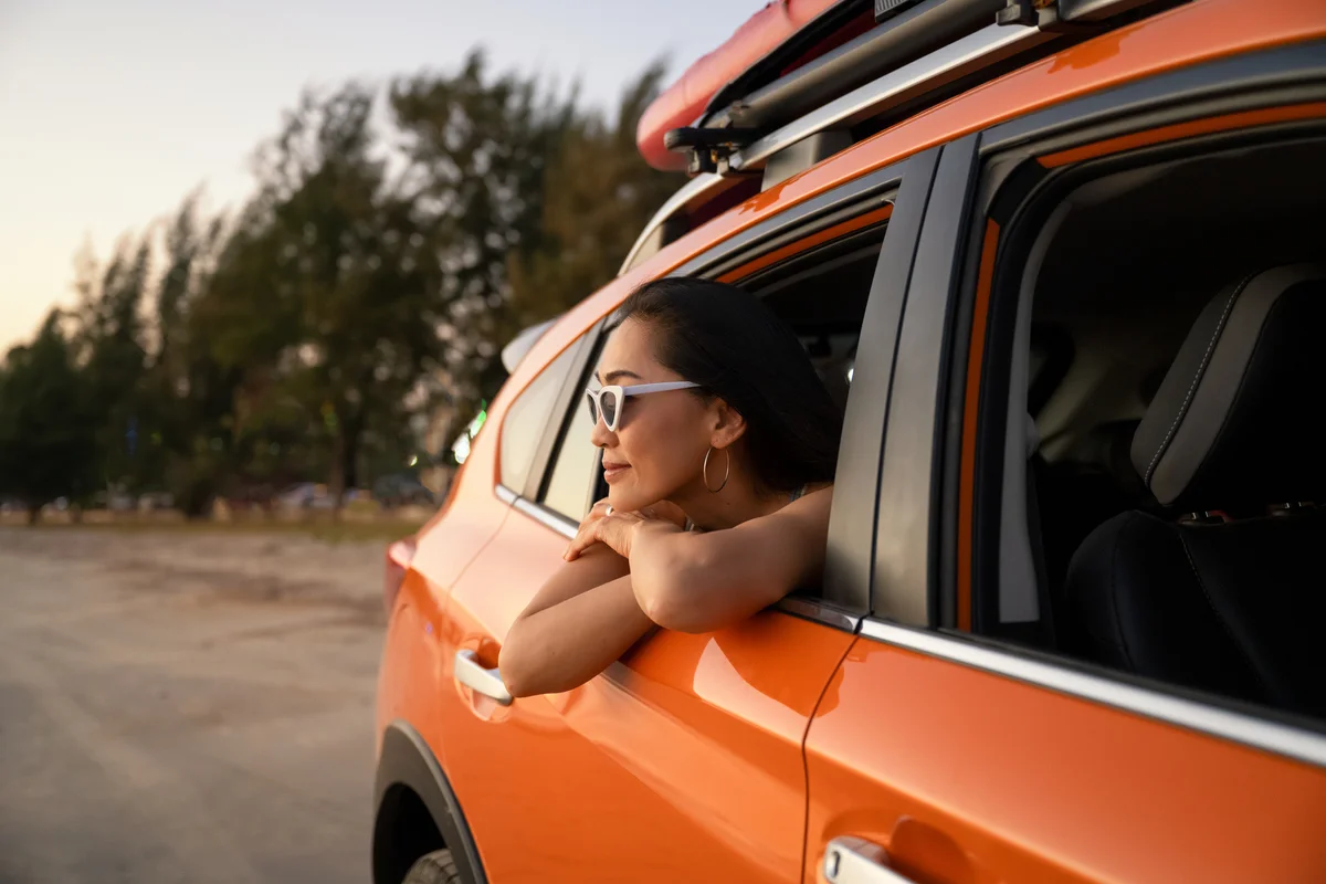 woman in a car on Road trip