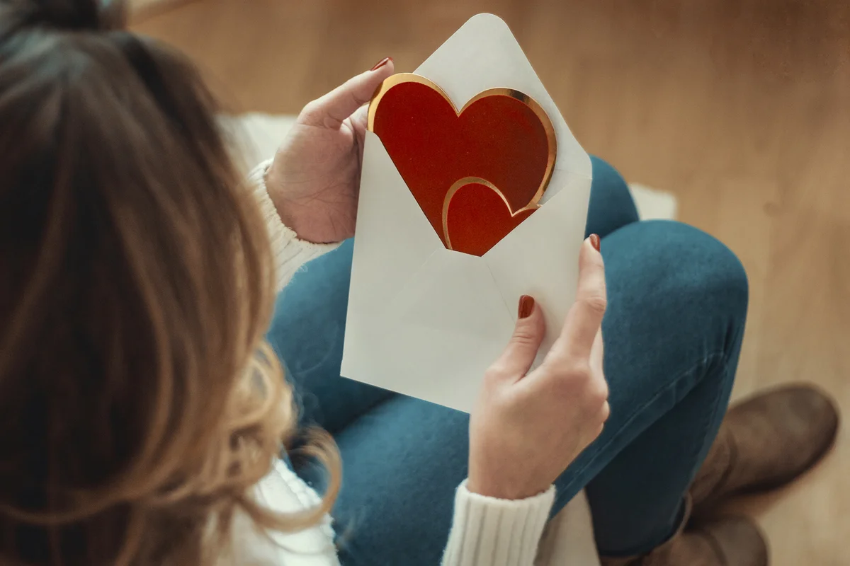 young woman with valentines card
