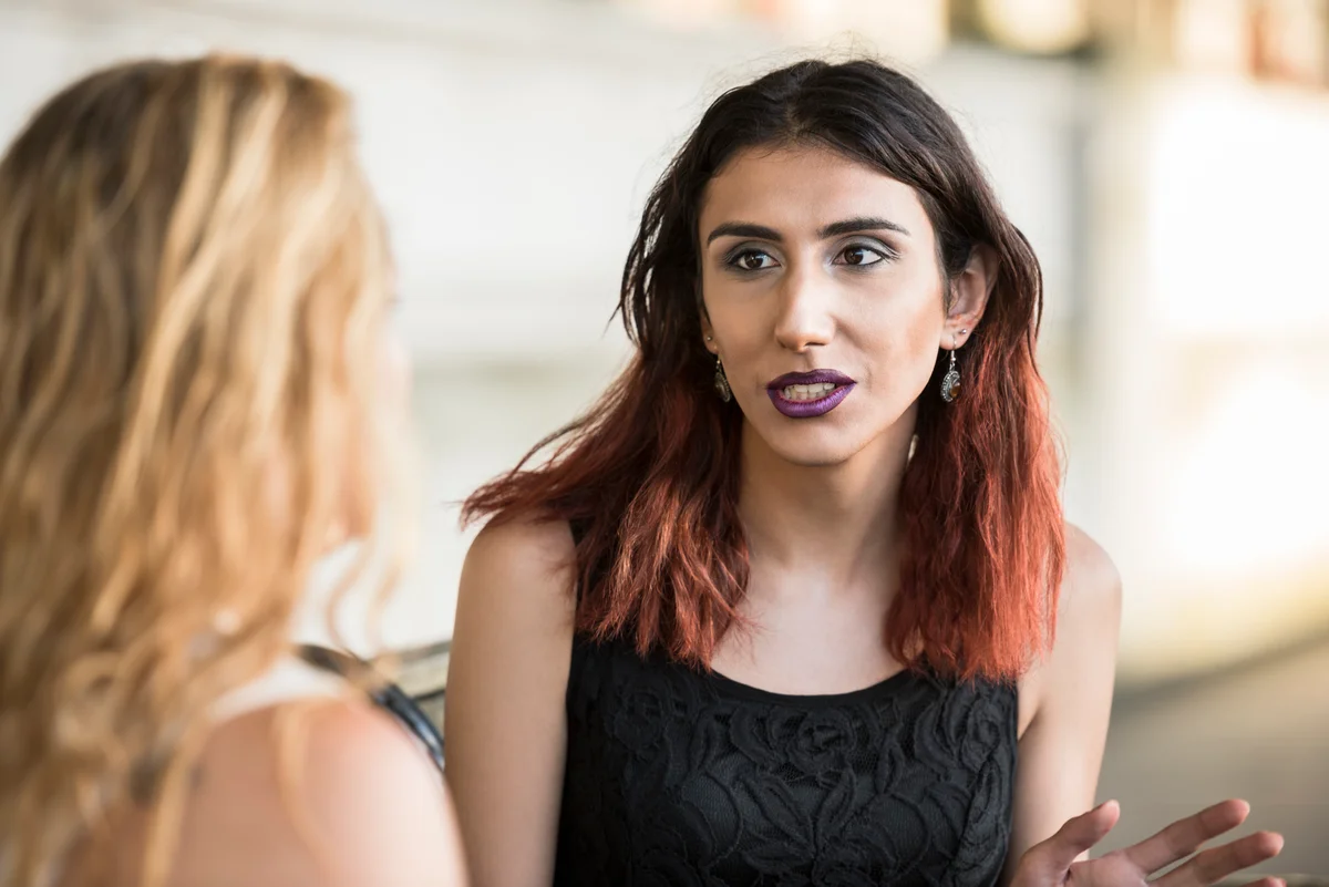 candid portrait of friends having conversation