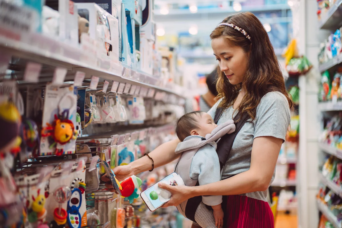 Young mom shopping for baby products