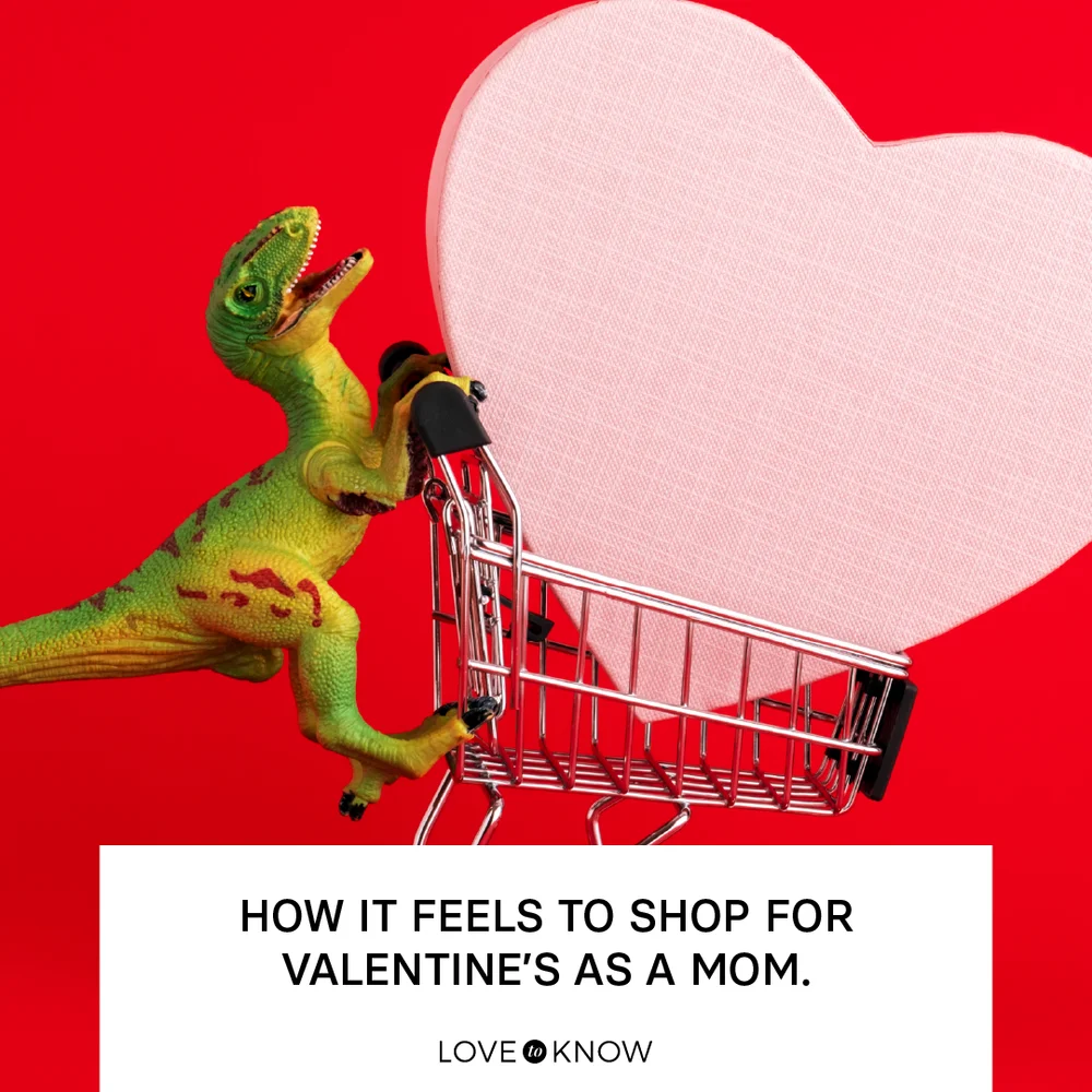 Dinosaur toy with shopping cart with big pink heart