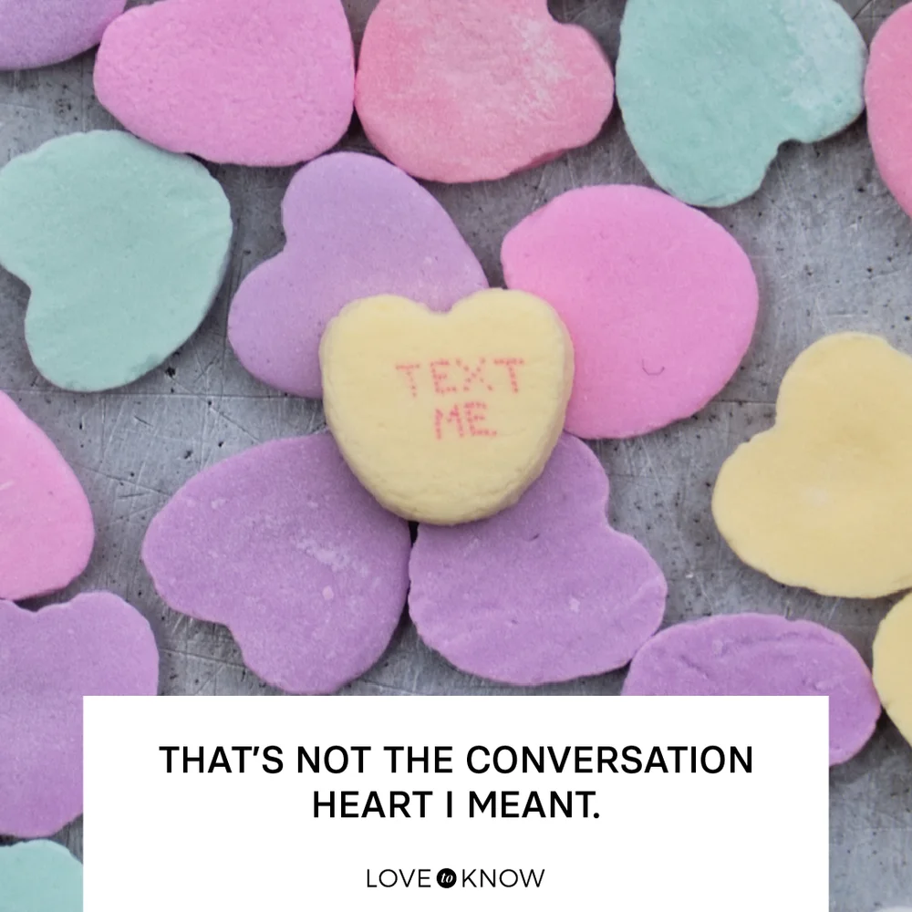 Multi colored heart shape candy on table