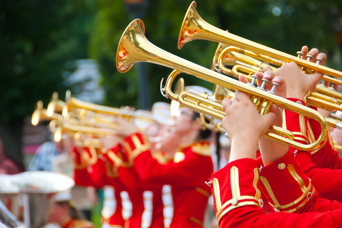 Brass Band in red uniform performing