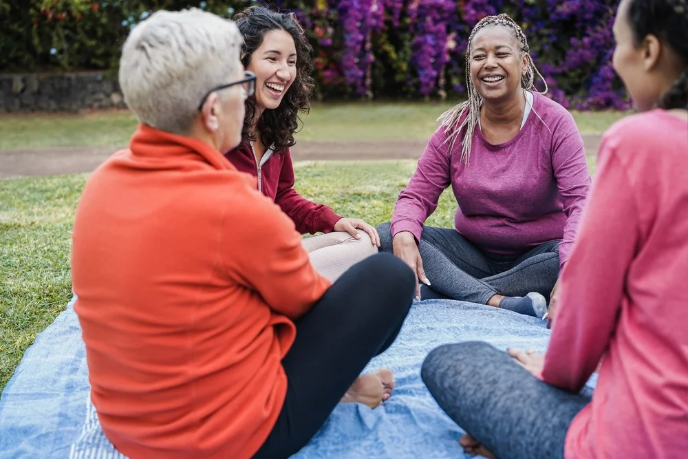 adults sitting in a circle