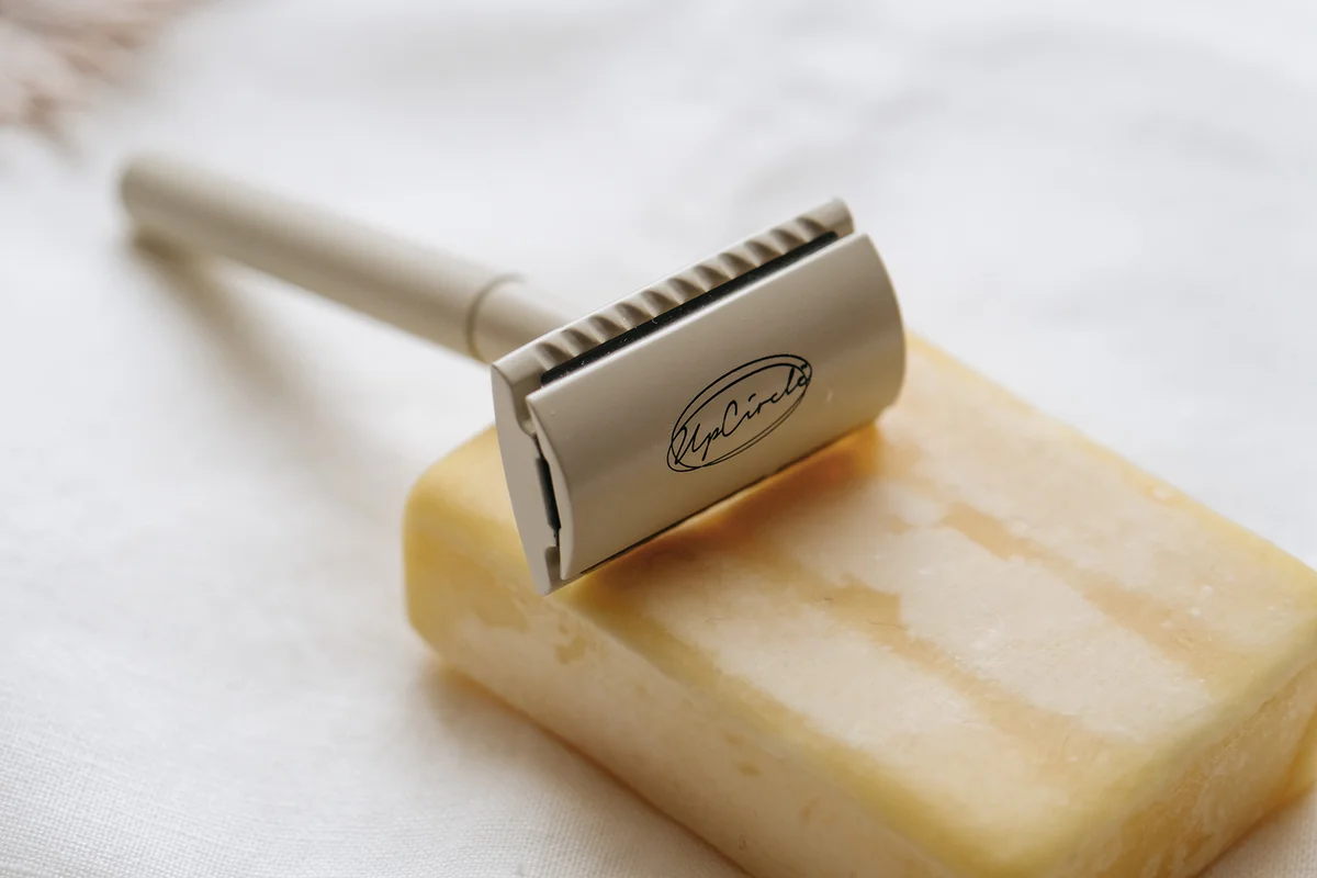 Sustainable zero waste safety razor on a solid soap bar