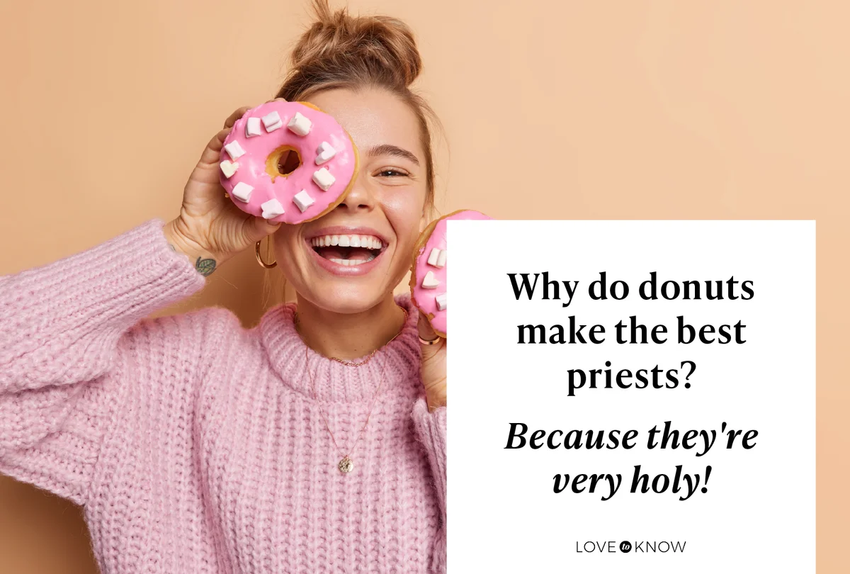Joyful woman covers eye with delicious glazed donuts