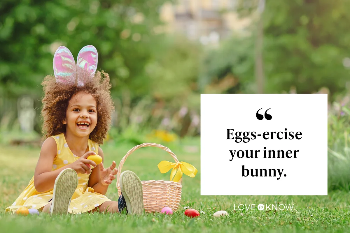 Little girl wear bunny ears and gathering Easter eggs