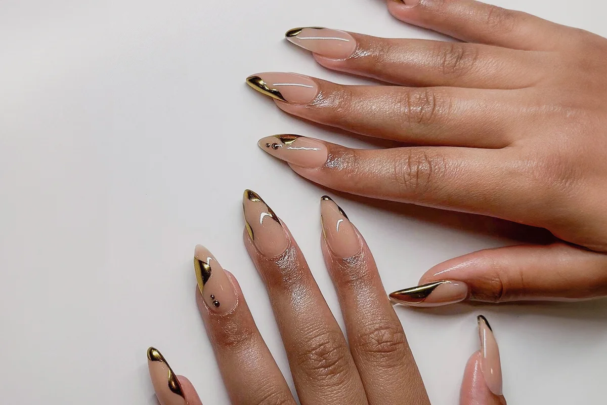 Almond gold chrome French tip nails