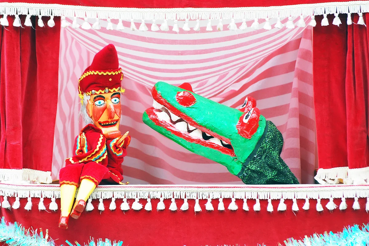 Closeup of puppets showing punch and crocodile