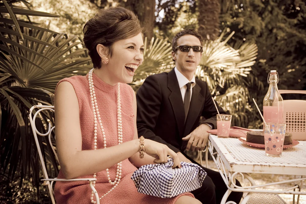 Retro couple in a garden lunch
