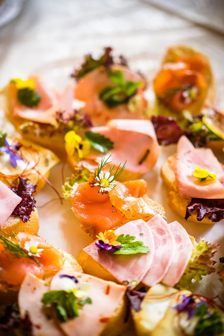 Detail of a colorful arrange of canapés
