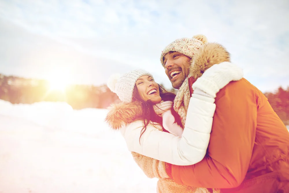 Couple woman and man hugging in winter