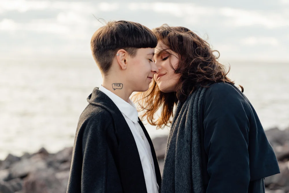 Romantic lesbian couple at the beach