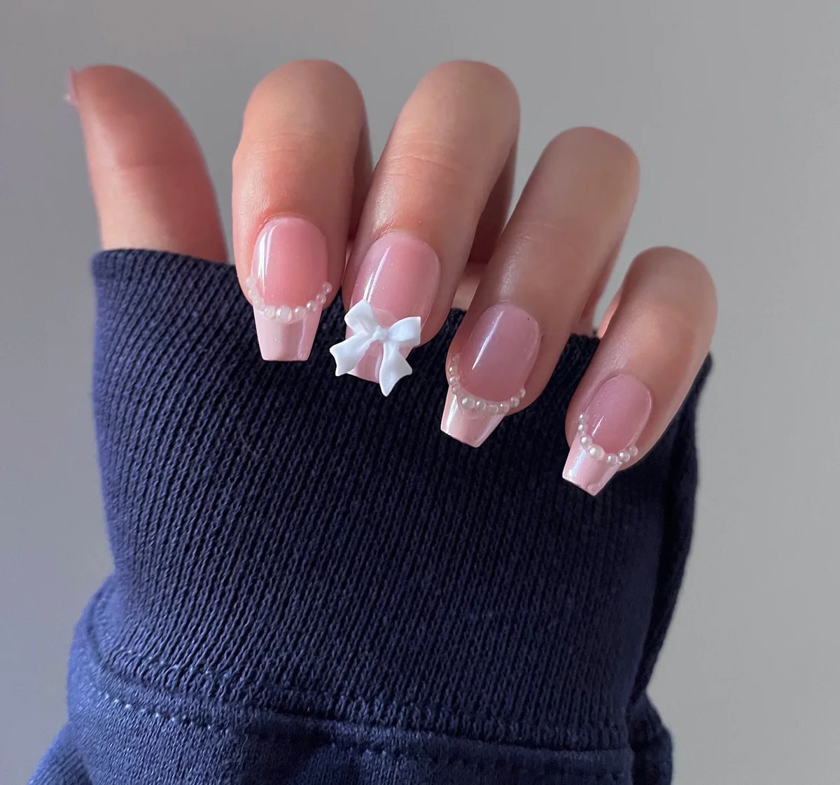 Coquette nails with bow