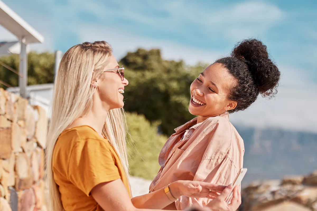 Women talking outdoors