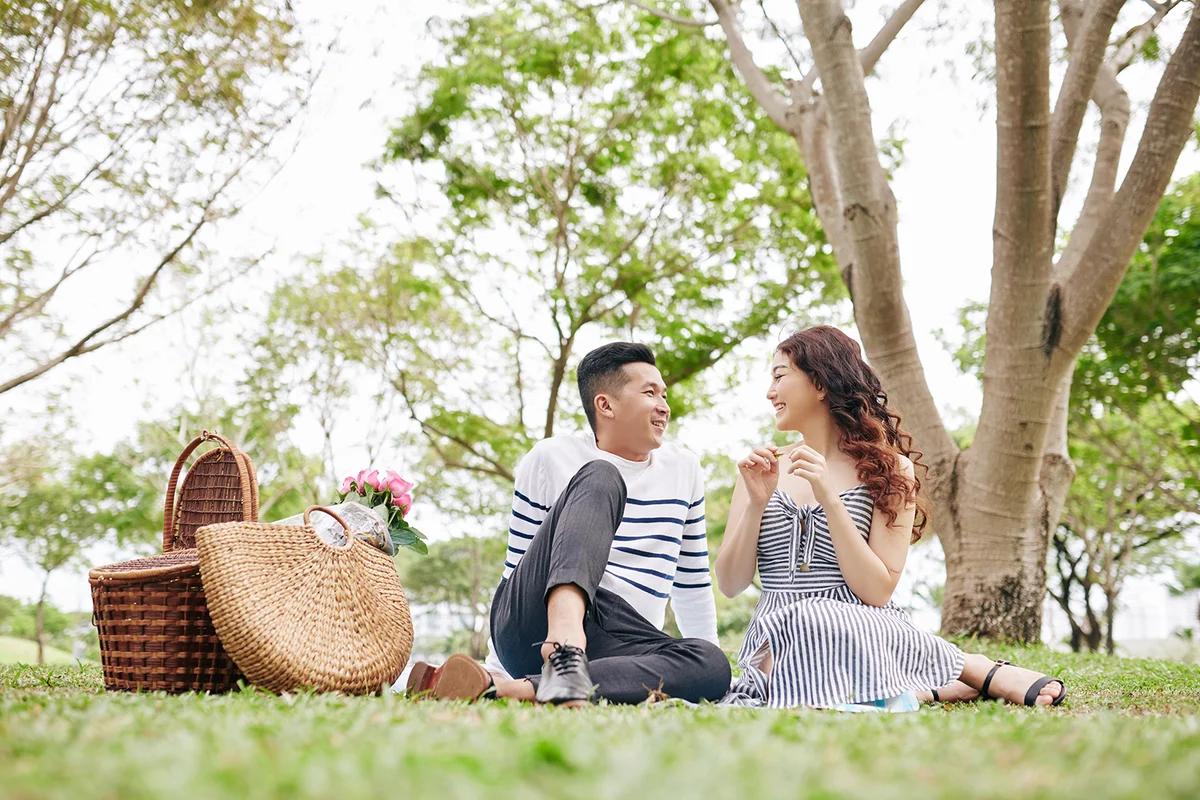 Couple having picnic outdoors