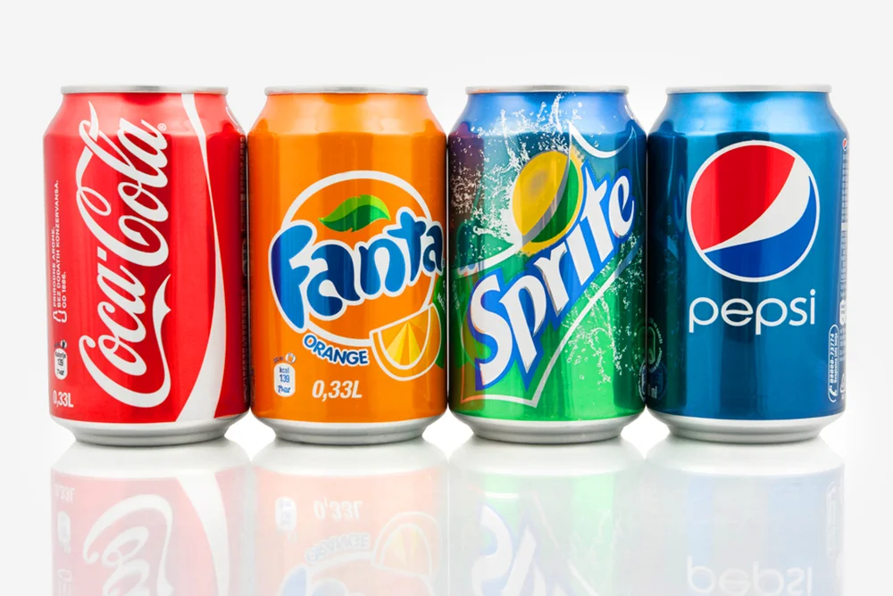 Cans of different renowned brands of sodas