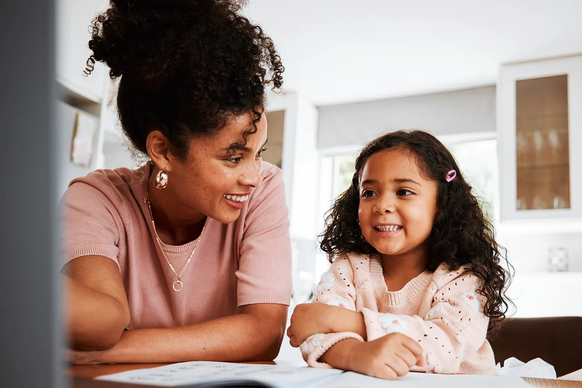 mother and child talking over computer