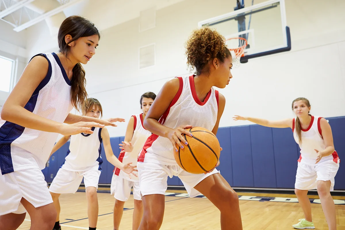 Girls playing basketball