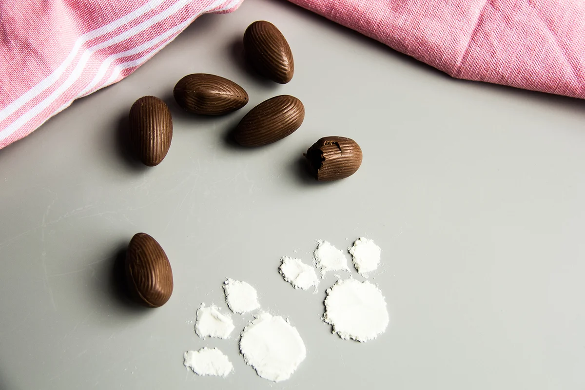 chocolate easter eggs and rabbit footprints