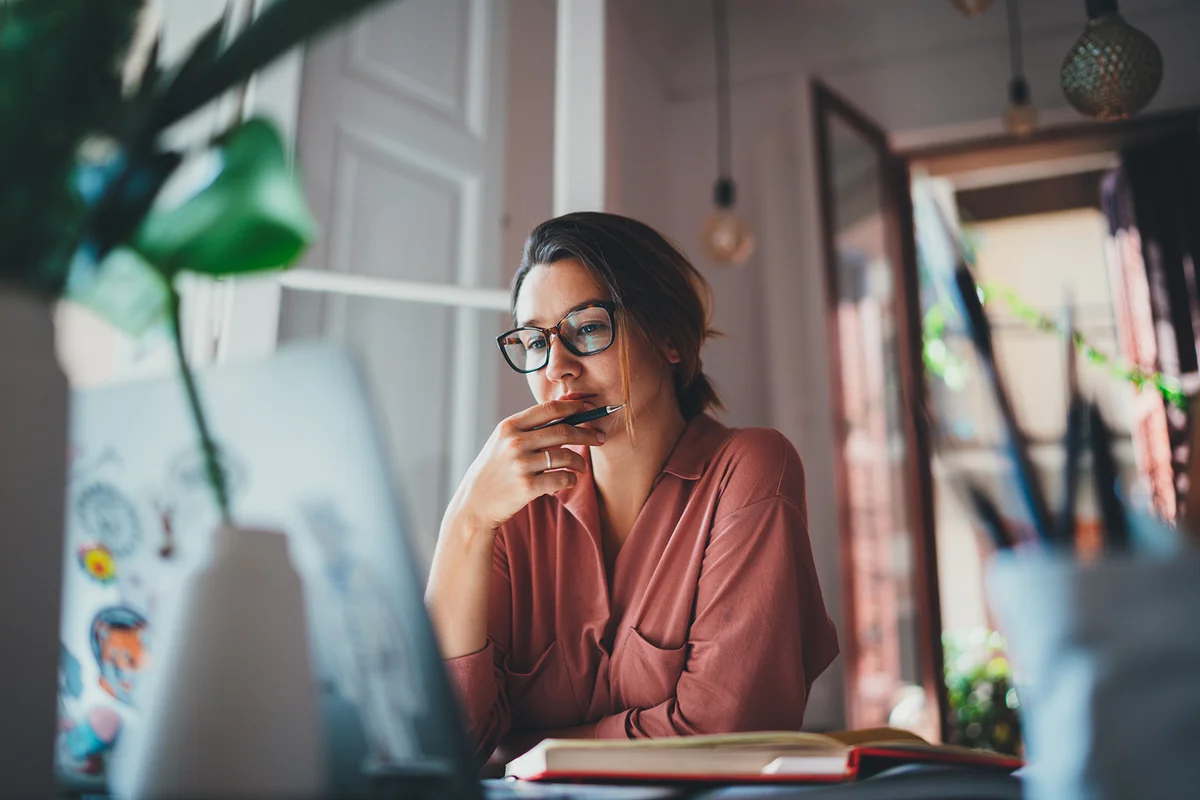 Young businesswoman thinking about something