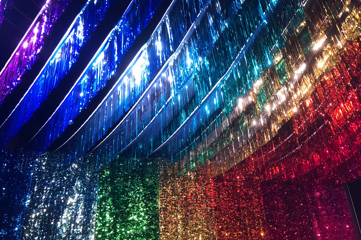 Rainbow Streamers Hanging from the Ceiling and Walls