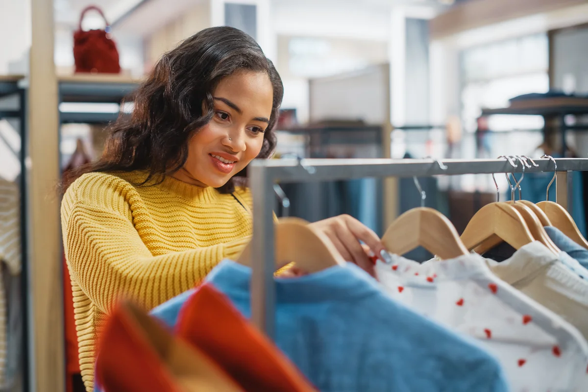emale Customer Shopping in Clothing Store, Choosing Stylish Clothes