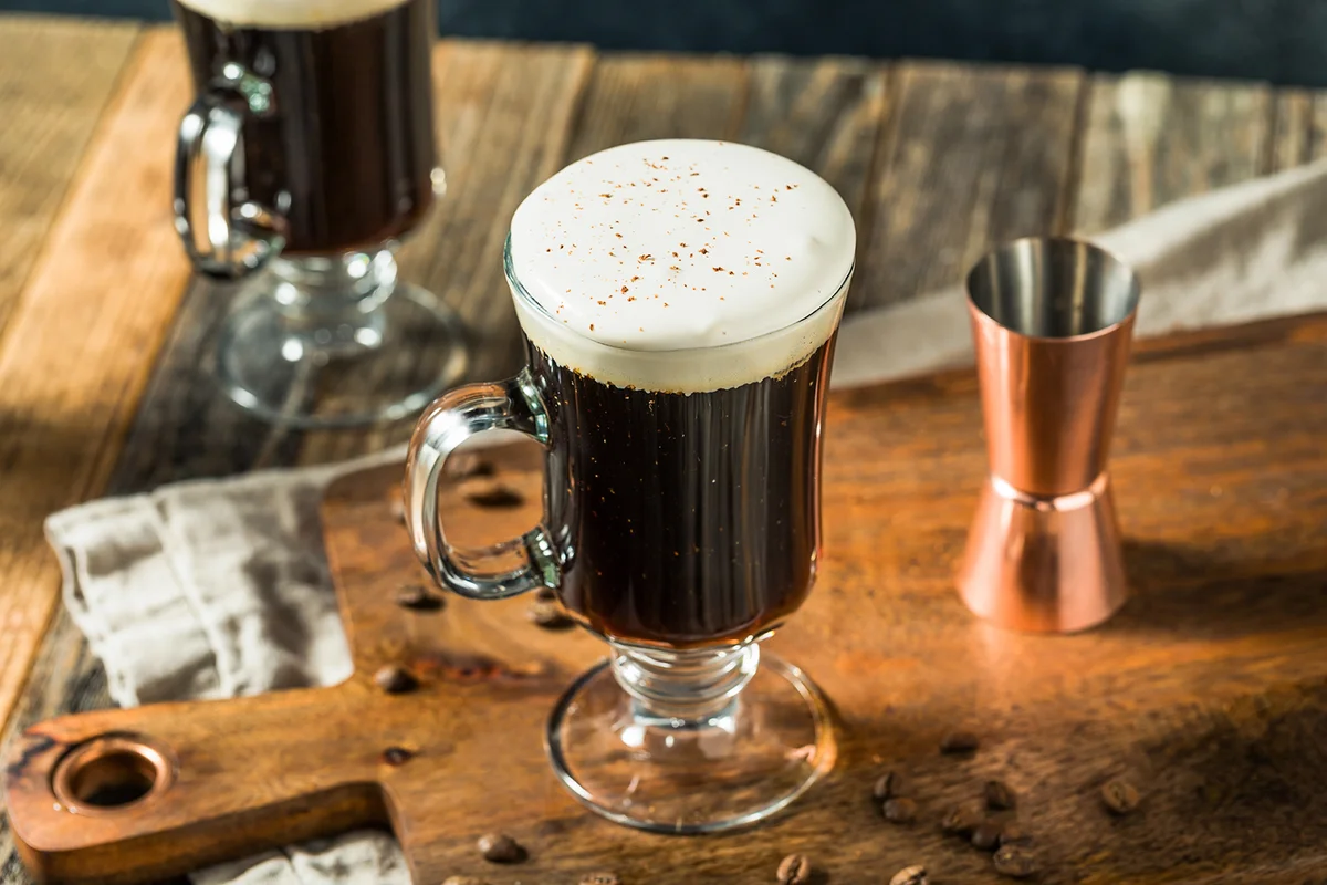 Warm Boozy Irish Coffee with Whipped Cream and Whiskey