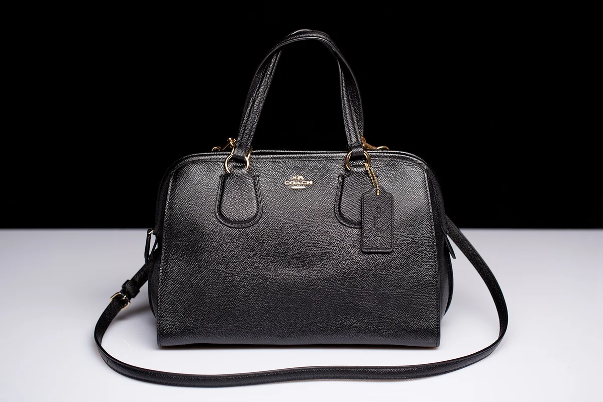 Black leather bag firm Coach