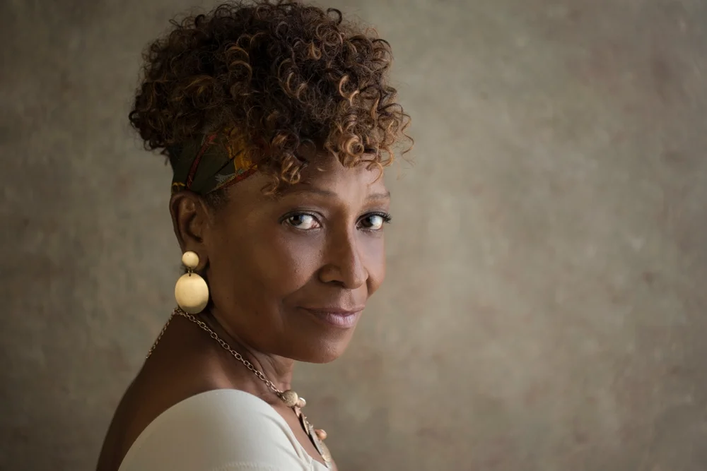 beautiful senior woman with curly hair