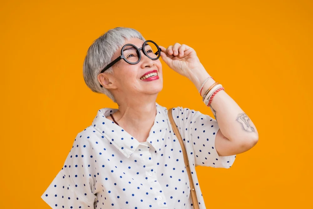 woman with glasses and short hair