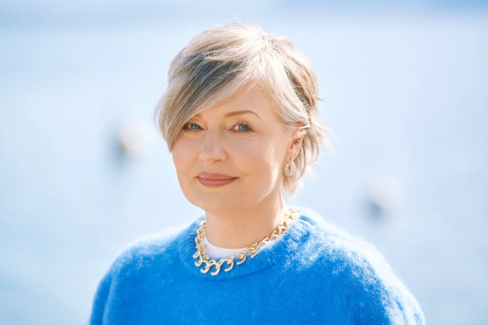 woman with long, side-swept bangs