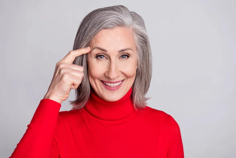 senior woman in a red sweater