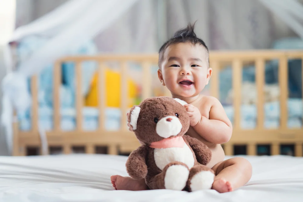 baby boy with teddy bear