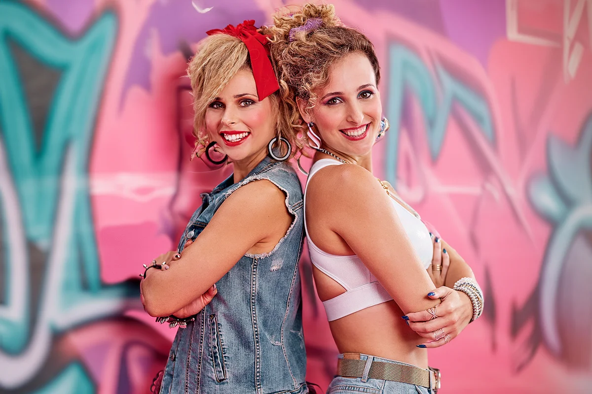 0s fashion and portrait of happy women in studio together with smile