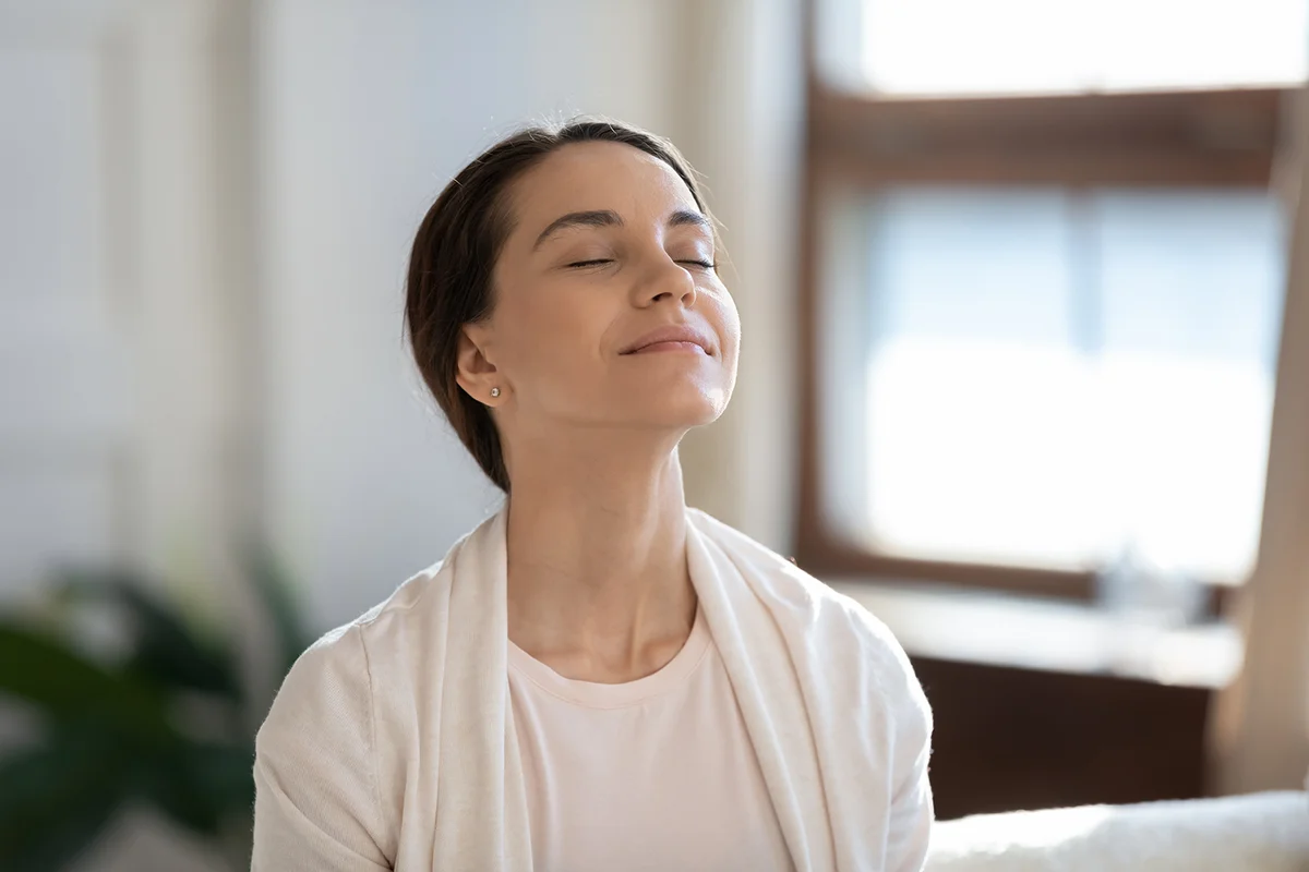 Woman breathing fresh cool air