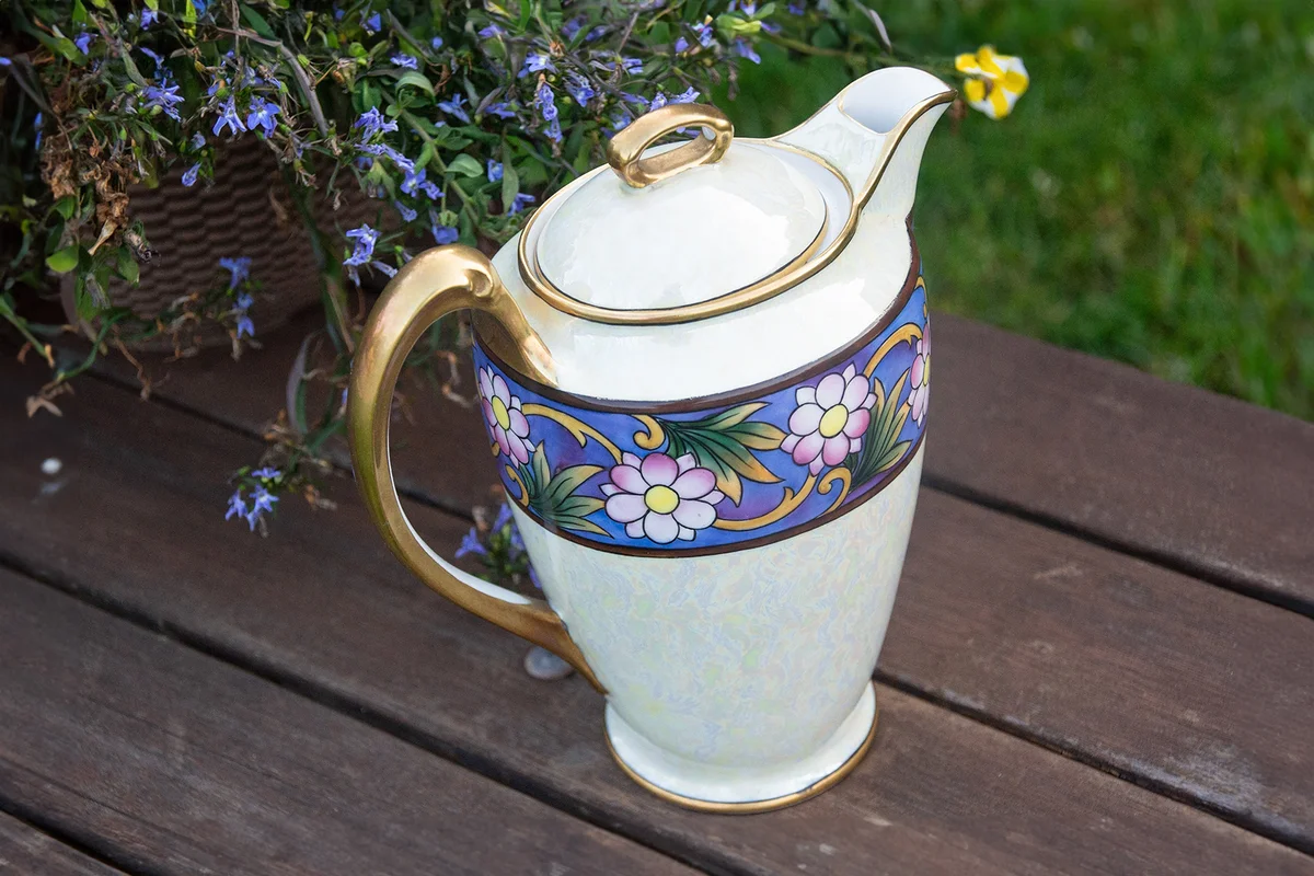 Vintage Noritake Chocolate Pot sitting on bench outside