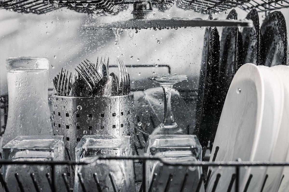 cutlery and glasses are washed in the dishwasher