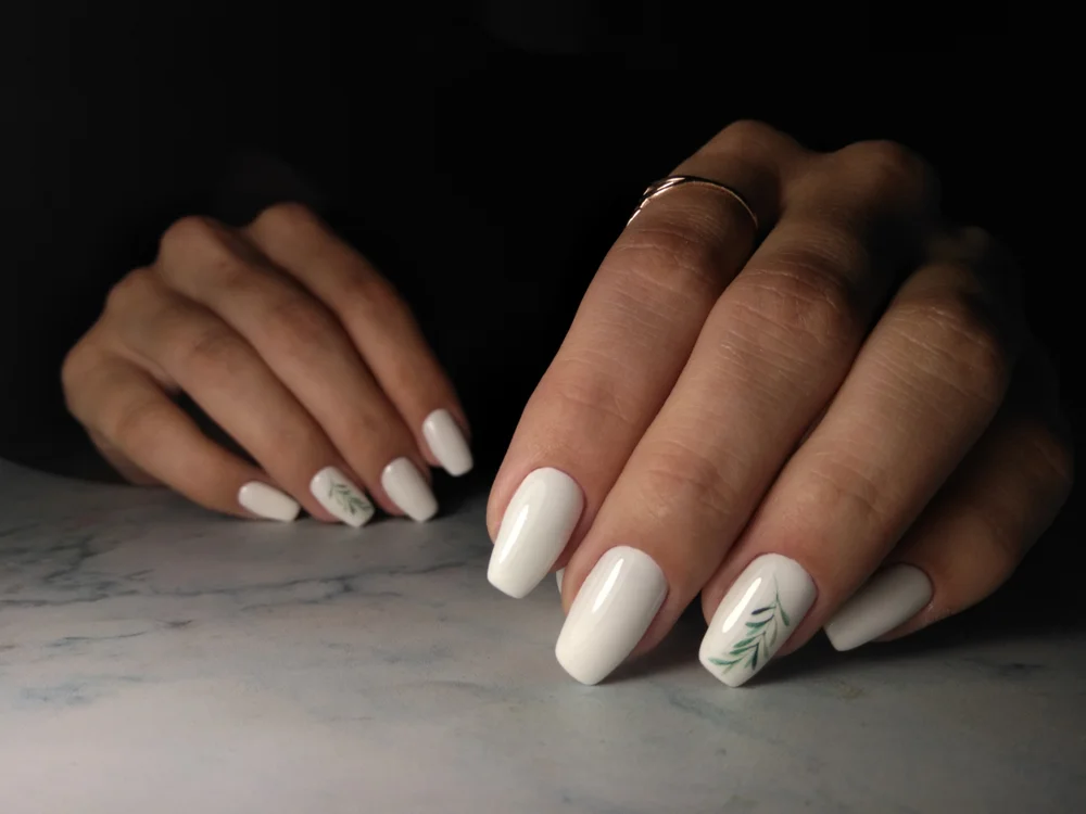 Embellished white nails