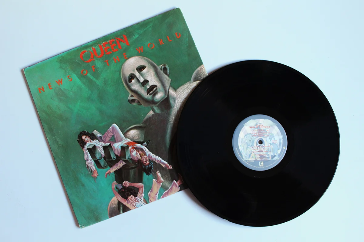 Queen music album on vinyl record LP disc. Titled: News of The world album cover