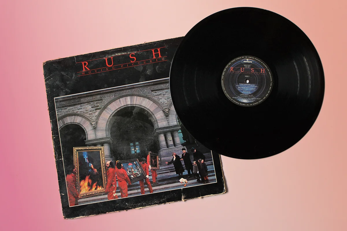 Progressive Canadian Rock band, RUSH music album on vinyl record LP disc. Titled: Moving Pictures album cover