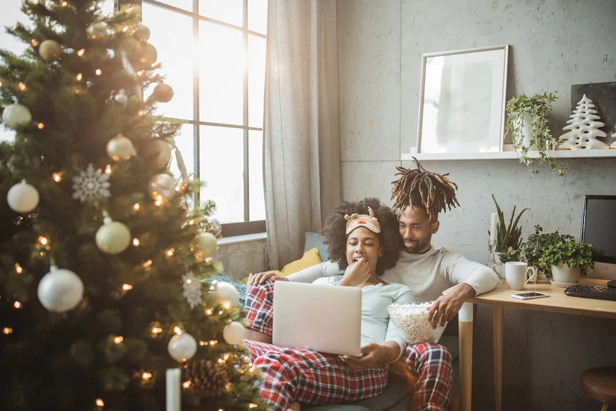 Young couple celebrating Christmas at home