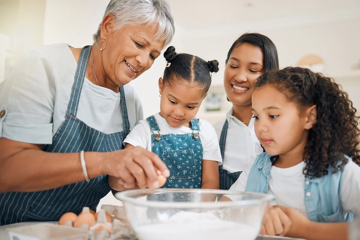 Grandmother teaching, mom or kids baking