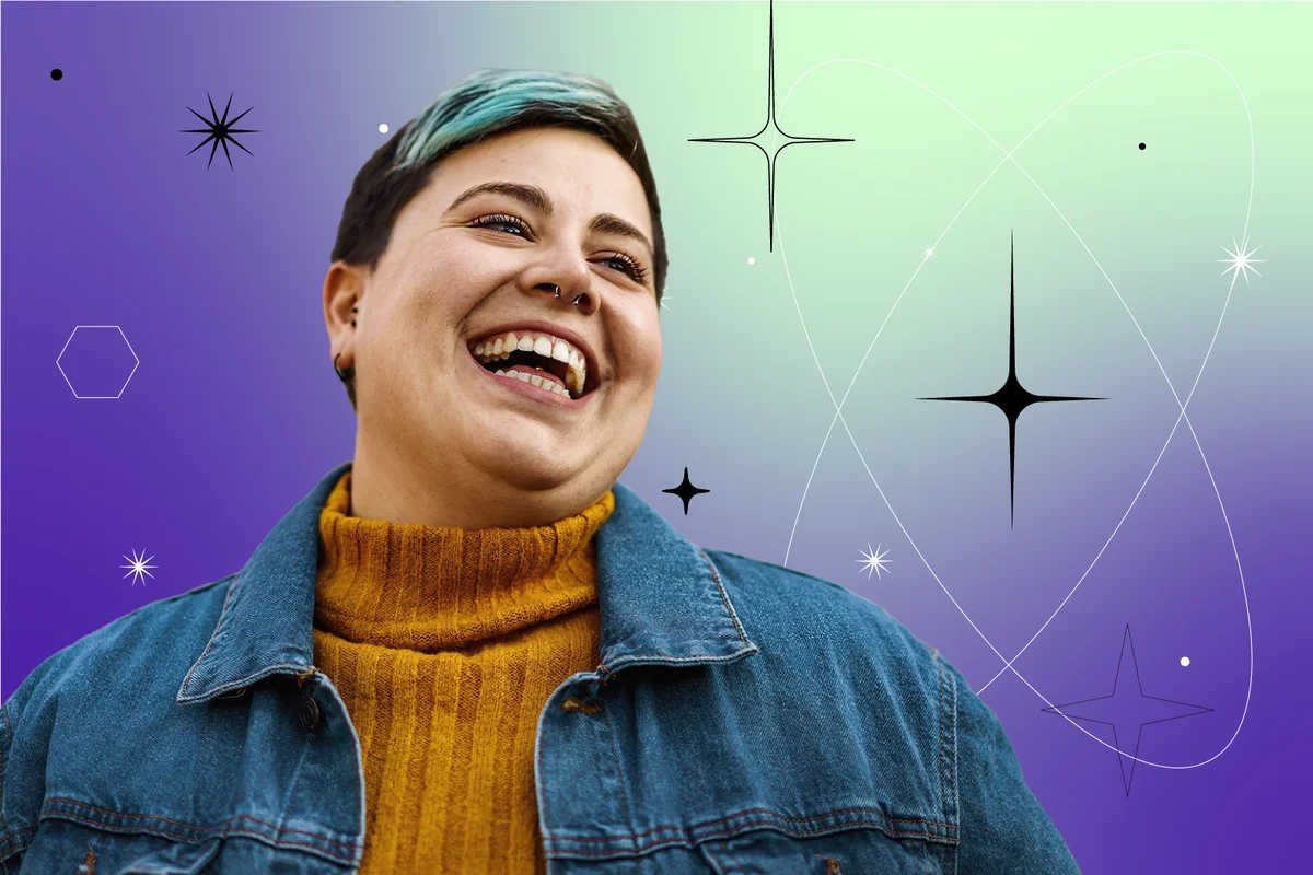 person smiles showing their teeth