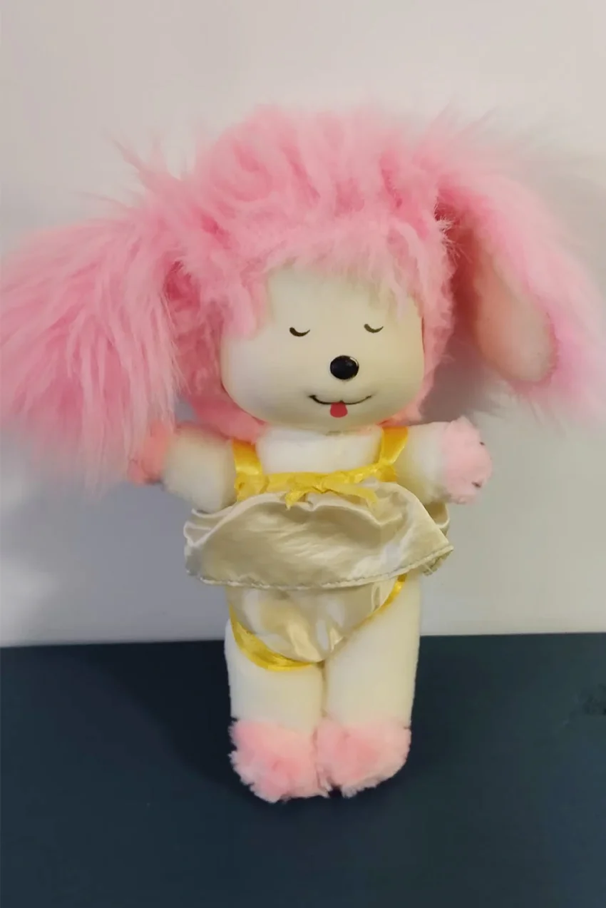 Poochie vintage pink and white dog toy by Mattel.